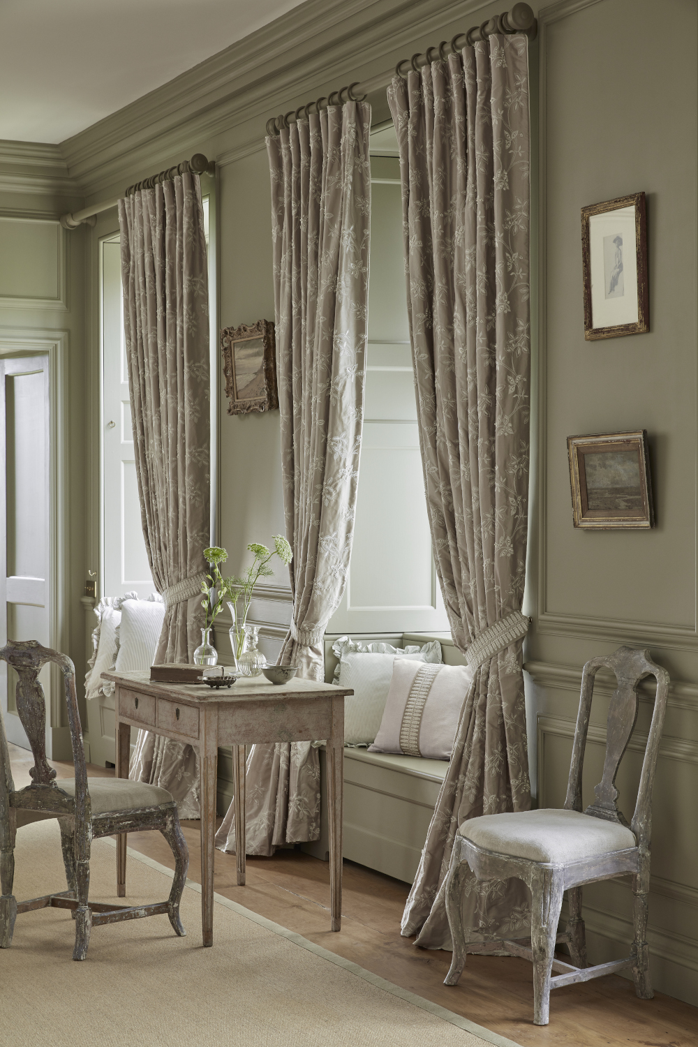 Image of floor length silk curtains, neutral colour scheme